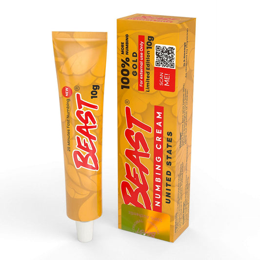 Cosmetic cream in a gold tube and matching box, with red BEAST lettering, black text and a QR code; The Beast Numbing Cream.